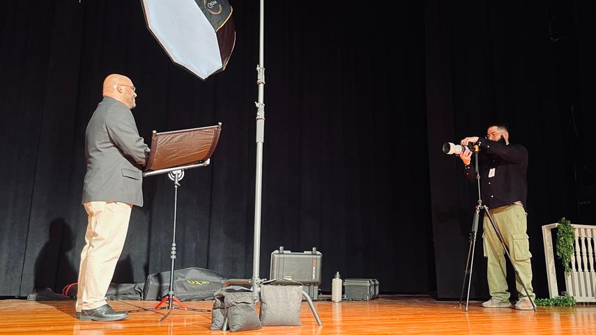 photographer taking headshots at career fair